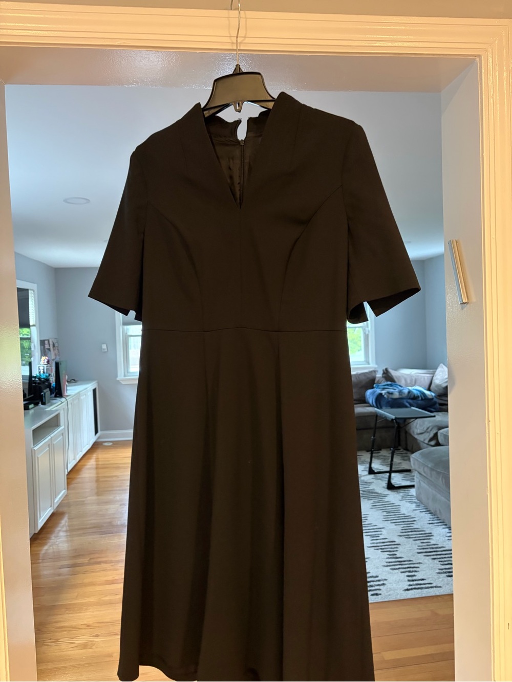 Elegant Black Midi Dress with V-Notch Neck